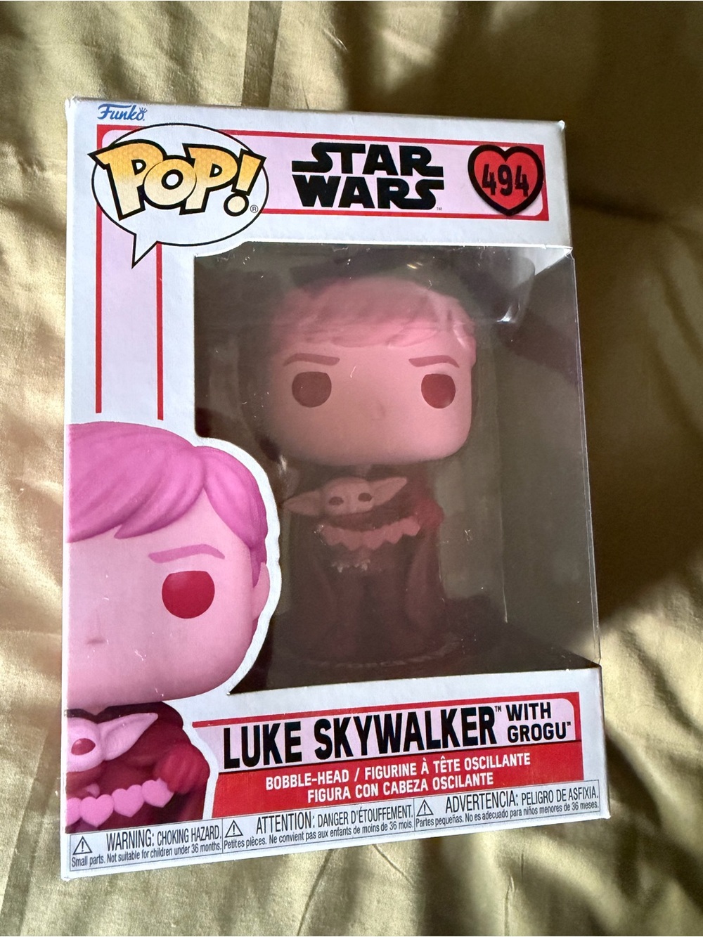 Funko Pink Luke Skywalker with Grogu Pop! Collectible